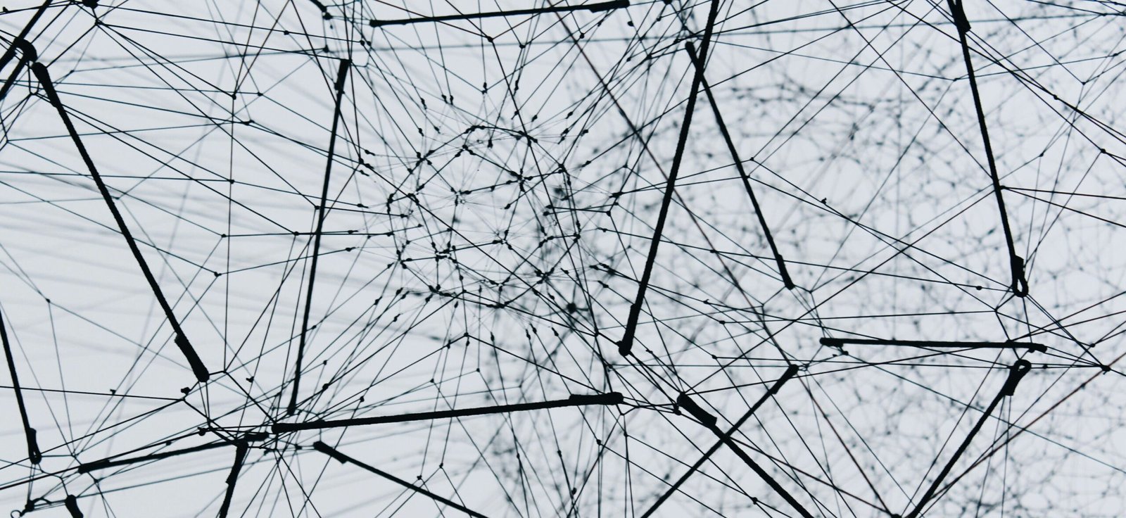 Abstract network of interconnected lines and nodes representing complex data connections and the future of data science.